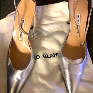 Manolo Blahnik silver strap heels.